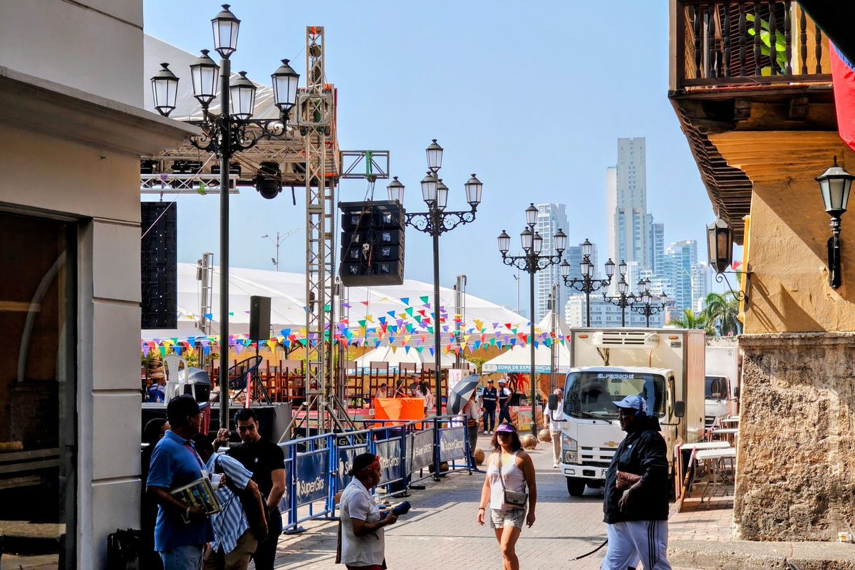Street in Cartagena's old town leading toward the modern city skyline