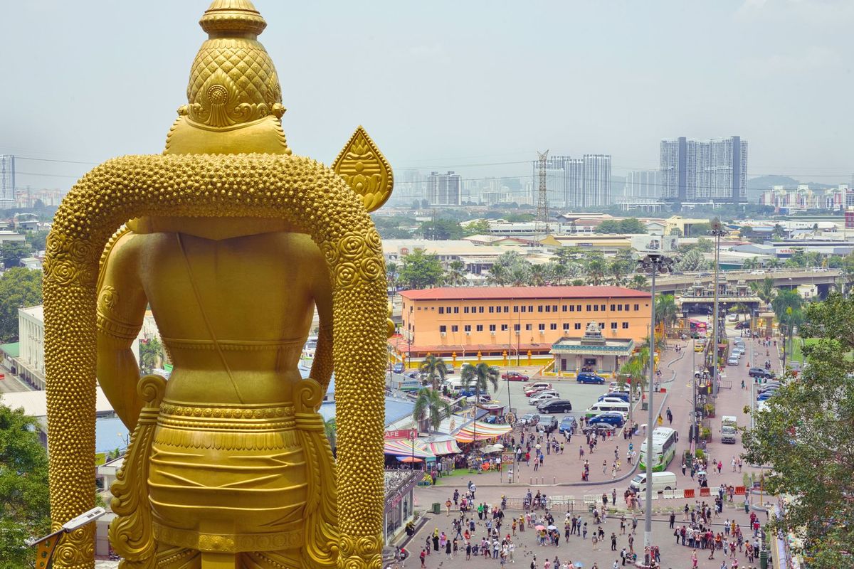 Giant Murugan statue at Batu Caves entrance, overlooking Kuala Lumpur