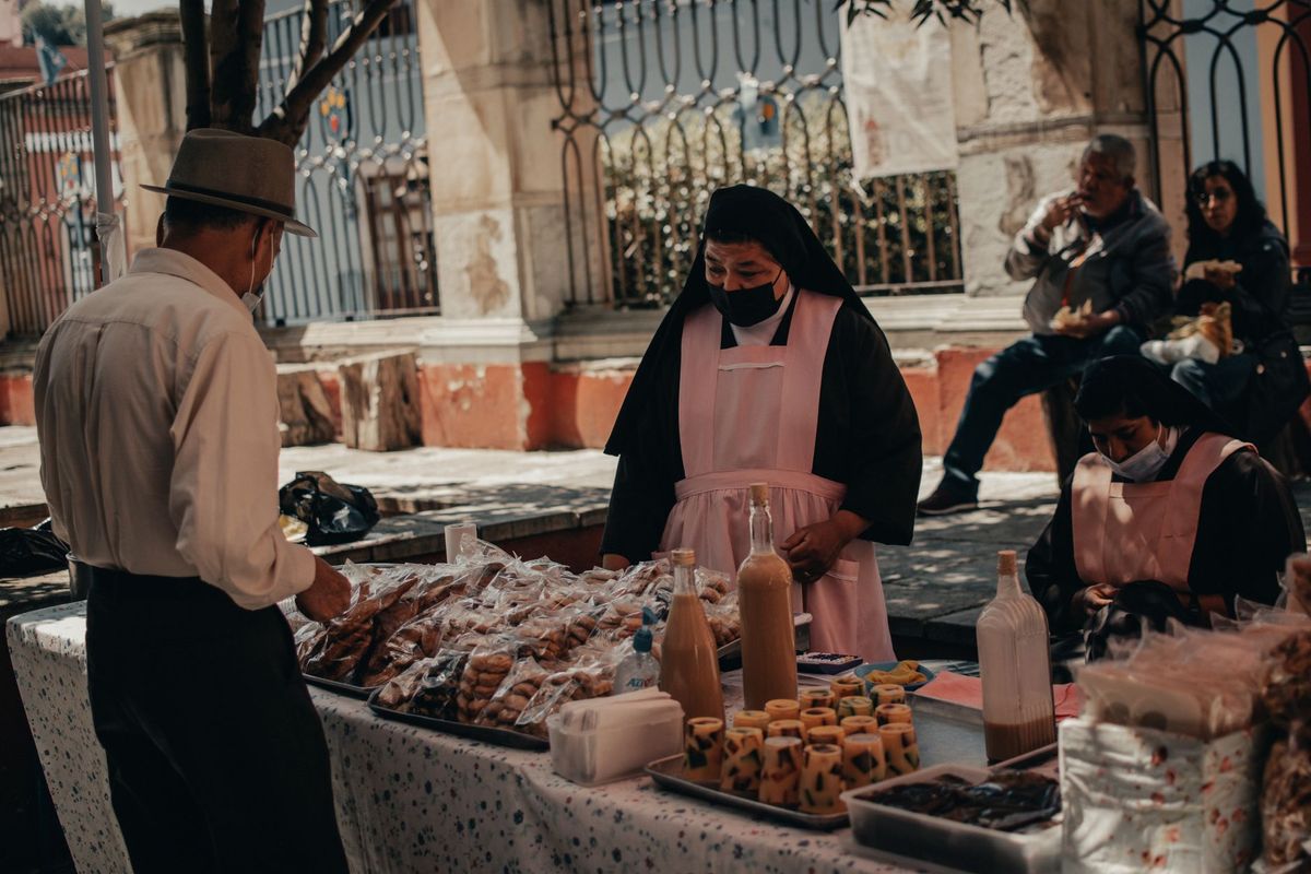Street food stall near a plaza in Tulum town center